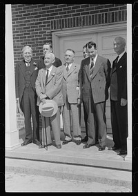 [Untitled photo, possibly related to: Governor Hooey with members of Caswell County Communities at the dedication of the new Anderson High School building. Caswell County, North Carolina]. Sourced from the Library of Congress.