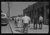 Workers entering plant at afternoon change of shift. Pratt and Whitney plant, United Aircraft, East Hartford, Connecticut. Sourced from the Library of Congress.