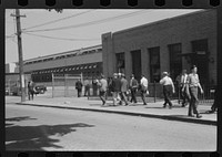 Workers entering plant at afternoon change of shift. Pratt and Whitney plant, United Aircraft, East Hartford, Connecticut. Sourced from the Library of Congress.