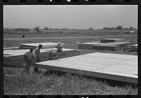 Prefabricated defense housing under construction near airport, Hartford, Connecticut. Constructed and managed by FSA (Farm Security Administration). Sourced from the Library of Congress.