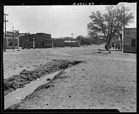 Main street of town. Shows irrigation ditch. Escalante, Utah. Sourced from the Library of Congress.
