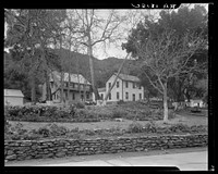 Hot Springs federal shelter. One of the five federal camps for homeless men in California. Year ago enrollment three hundred seventy five men, now one hundred fifty seven. Average age fifty; all physically disabled and not capable of manual or project work. Administration building. California. Sourced from the Library of Congress.