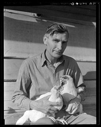 Rural rehabilitation client. Chicken farmer making good on rural resettlement loan. He sells one case of eggs a day. Worked on a state emergency relief administration job previous to loan. San Fernando Valley, California. Sourced from the Library of Congress.