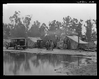 Migrant pea pickers camp in the rain. California. Sourced from the Library of Congress.