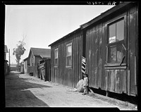 Mexican quarter of Los Angeles. One quarter mile from City Hall. Area has been condemned and will be torn down shortly to make space for the new Union Railroad station. Average rent is eight dollars. Sourced from the Library of Congress.