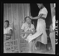  women near Earle, Arkansas by Dorothea Lange