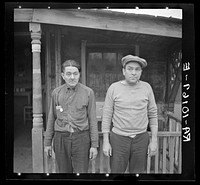 Two types living along the waterfront in Ottawa, Illinois by Russell Lee