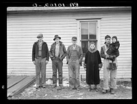 Part of family of Charles H. Mitchell, sixty-three years old. Mitchell has rented farms in the past but, because of inability to get a farm, worked as hired hand. Sons have been able to find but very little work. Family is on unemployment relief in Estherville, Iowa by Russell Lee