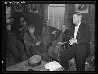 Soil conservation meeting of farmers in Livingston County, Illinois. The agricultural program for 1937 is being explained to them by Russell Lee