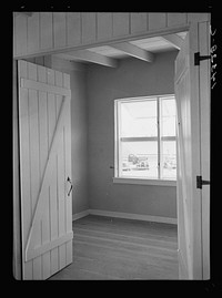 Chandler tract, Arizona. Apartment building, interior view by Russell Lee