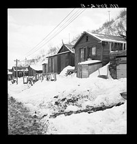 [Untitled photo, possibly related to: Consumers, near Price, Utah. Company housing. Rent approximately eight dollars monthly in Utah coal town]. Sourced from the Library of Congress.