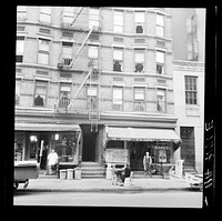 [Untitled photo, possibly related to: Background photo for Hightstown project. The present home of Mr. and Mrs. Jacob Solomon and family, 133 Avenue D, New York City. This family is included in the first unit of thirty-five families to be resettled at Hightstown in July, 1936. For four very small rooms in tenement they pay eighteen dollars monthly]. Sourced from the Library of Congress.