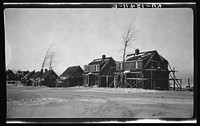 House under construction. Ironwood Homesteads, Michigan by Russell Lee