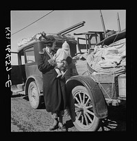 Mexican child. She helps tie carrots in the field. Coachella Valley, California. Sourced from the Library of Congress.