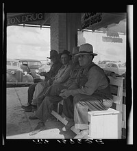 Dust bowl farmers of west Texas in town. Sourced from the Library of Congress.