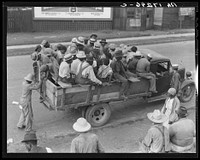 Memphis, Tennessee. Cotton hoers are transported to the fields daily during the season. Truck drivers are paid by the planters and serve as "runners" to recruit the men. Trucks leave at five o'clock in the morning for the Arkansas Delta plantations.. Sourced from the Library of Congress.