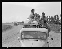 Mississippi Delta, on Mississippi highway No. 1 between Greenville and Clarksdale. Negro laborer's family being moved from Arkansas to Mississippi by white tenant by Dorothea Lange