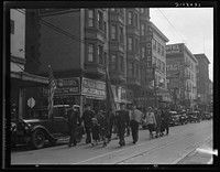 Salvation Army, San Francisco, California. Regular Sunday meeting. (Meeting held regularly Sundays, Tuesdays, Thursdays.) Marching up the street to the meeting. Sourced from the Library of Congress.