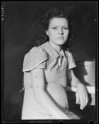 Daughter of migratory family in Farm Security Administration (FSA) labor camp. Calpatria, Imperial Valley, California. Sourced from the Library of Congress.