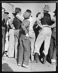 Watching ball game. Shafter migrant camp. California. Sourced from the Library of Congress.