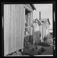 Grandmother and grandchild. Greenfield, Salinas Valley, California. From farm family originally in Missouri, then Iowa. Migrants to California. Sourced from the Library of Congress.