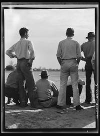 [Untitled photo, possibly related to: Watching ball game. Shafter camp for migrants. California]. Sourced from the Library of Congress.