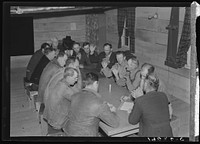 Farm Security Administration (FSA) camp for migratory agricultural workers. Farmersville, California. Meeting of camp council. Sourced from the Library of Congress.