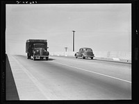 [Untitled photo, possibly related to: Between Tulare and Fresno. Overpass on U.S. 99 (see general caption). California] by Dorothea Lange