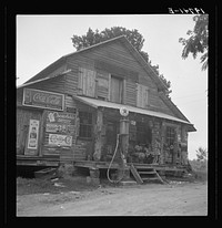 [Untitled photo, possibly related to: Daughter of white tobacco sharecropper at country store. Person County, North Carolina]. Sourced from the Library of Congress.