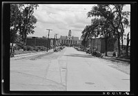 The Chatham County courthouse. Looking down the main street on entering town. Pittsboro, North Carolina. Sourced from the Library of Congress.