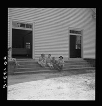 [Untitled photo, possibly related to: Conversation among members of congregation after services. Wheeley's Church, Gordonton, North Carolina]. Sourced from the Library of Congress.