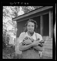 [Untitled photo, possibly related to: Mrs. Schrock takes good care of her family. Yakima Valley, Washington (near Wapato)]. Sourced from the Library of Congress.