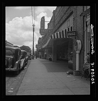 Untitled photo, possibly related to: The main street, Fayeteville Street, of Siler City, North Carolina.. Sourced from the Library of Congress.