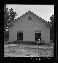 [Untitled photo, possibly related to: Congregation entering church. Wheeley's Church. Person County, North Carolina]. Sourced from the Library of Congress.