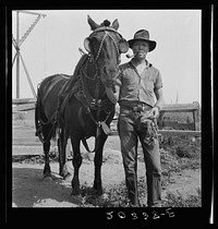 Hired man on the Myers farm. Near Outlook, Yakima County, Washington. Sourced from the Library of Congress.