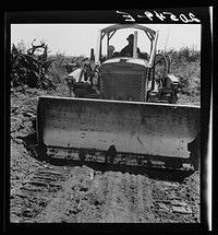 Western Washington, Lewis County, near Vader. Bulldozer equipped with grader type blade. Nieman farm.. Sourced from the Library of Congress.