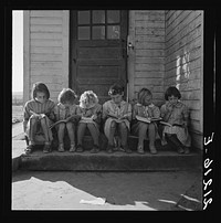 Girls of Lincoln Bench School study their reading lesson. Near Ontario, Malheur County, Oregon by Dorothea Lange. Sourced from the Library of Congress.