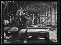 [Untitled photo, possibly related to: The sawmill in operation. It was built by the farmer members of the Ola self-help sawmill co-op. Gem County, Idaho. General caption 48]. Sourced from the Library of Congress.