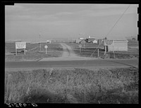 [Untitled photo, possibly related to: Entrance to Nyssa Farm family labor camp, FSA (Farm Security Administration) mobile unit number 1, just established before opening of beet season. Near Nyssa, Oregon]. Sourced from the Library of Congress.