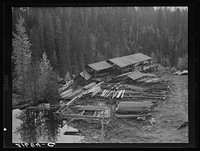 [Untitled photo, possibly related to: Small privately owned mill in the woods, recently discontinued. All the large mills in this area have cut out. Mission Creek, Boundary County, Idaho. General caption 49]. Sourced from the Library of Congress.