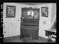 Organ in Alonza Heath home near Black River Falls, Wisconsin by Russell Lee