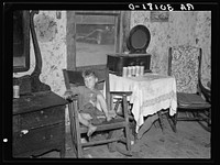 Small son of Earl Taylor in his home near Black River Falls, Wisconsin by Russell Lee