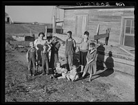Family of Floyd Peaches. Near Williston, North Dakota by Russell Lee