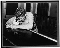 Man at the bar on Saturday night. Craigville, Minnesota by Russell Lee. Sourced from the Library of Congress.