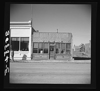 Post office. Des Lacs, North Dakota by Russell Lee