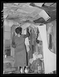 [Untitled photo, possibly related to: New Madrid County, Missouri. Space for clothes storage in sharecropper shack] by Russell Lee