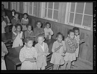 Schoolchildren singing. Lakeview Project, Arkansas by Russell Lee