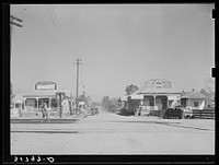 [Untitled photo, possibly related to: Looking across the railroad tracks into the  section of town. New Roads, Louisiana] by Russell Lee