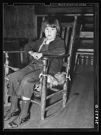 Child of family living in abandoned church near Laurel, Mississippi by Russell Lee