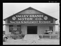 Tractor store. Harlingen, Texas by Russell Lee